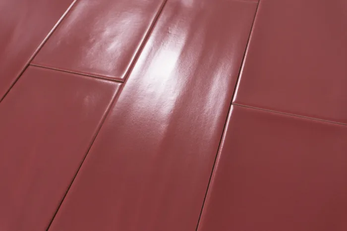 Metro Fliese bordeaux matt gewellt 10x30